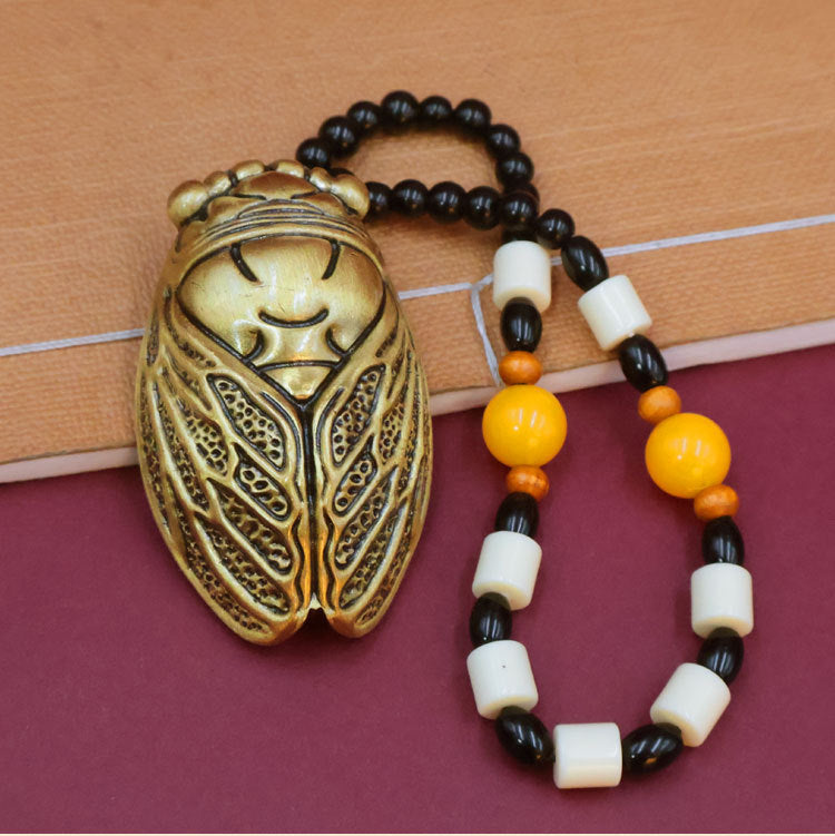 Golden cicada necklace